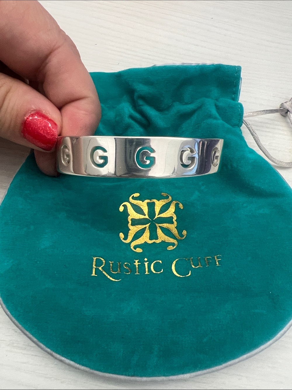 Rustic Cuff Silver Logo Cuff with Teal Pouch